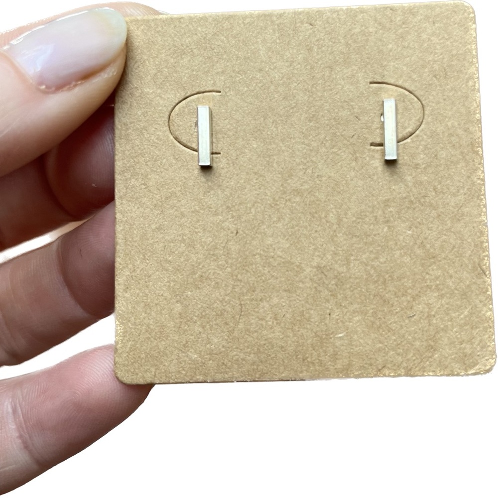 Sterling silver bar studs.
